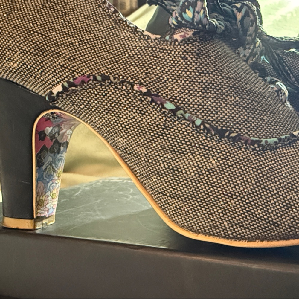 Irregular Choice: Black tweed, floral trim lace up pumps. 2 inch heels.